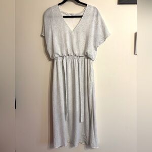 Sienna Sky Elegant White Dress with little black dots with belted waist
